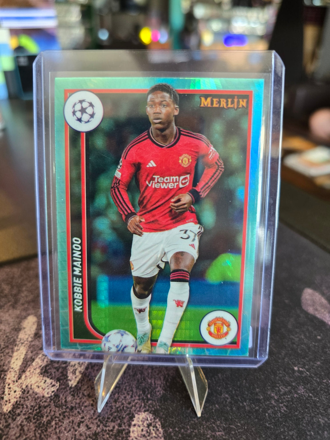 Topps Merlin UCL 2023-24 - Kobbie Mainoo 78 - Manchester United - Aqua