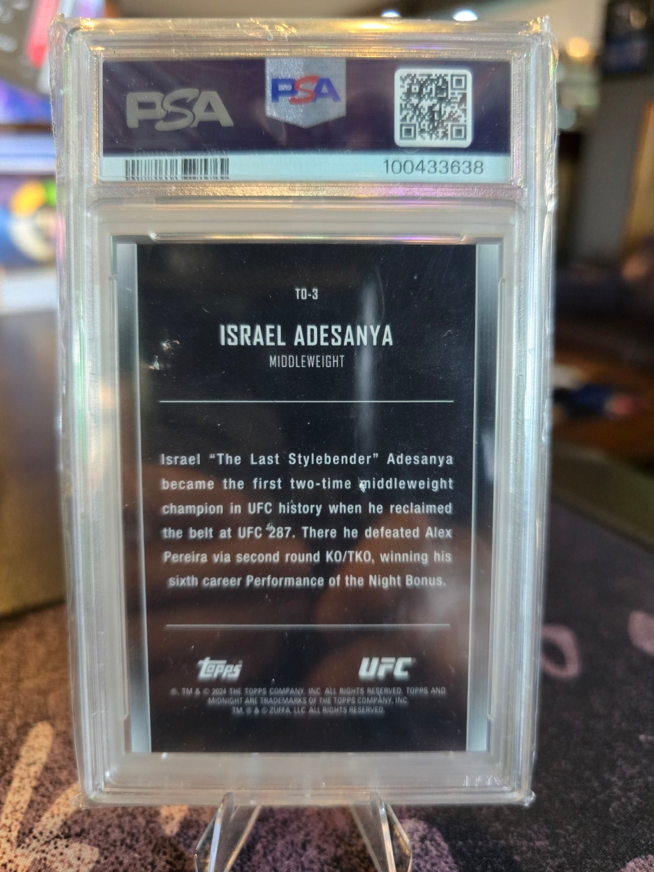 Topps Midnight UFC 2024 - Israel Adesanya - The One and Only (/49) Moonbeam PSA 8