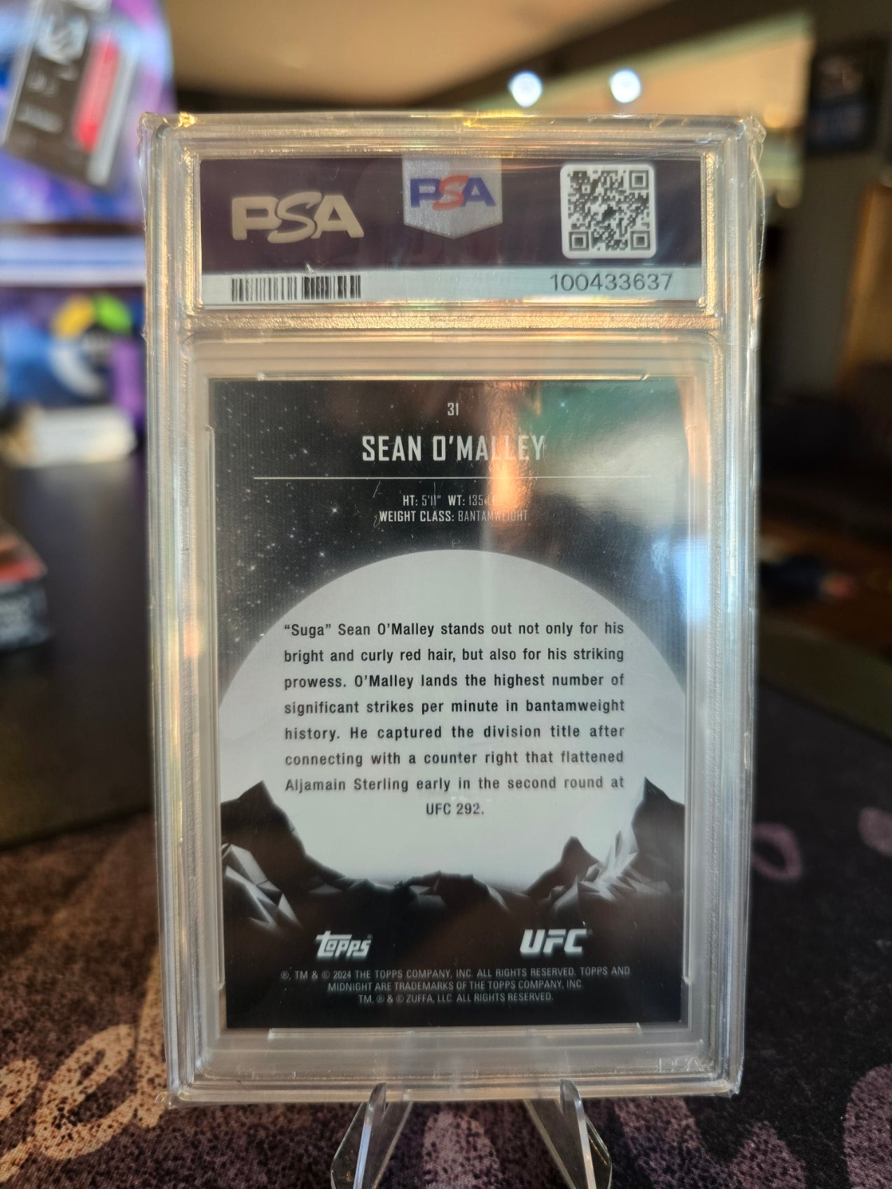 (Listed on Ebay) Topps Midnight UFC 2024 - Sean O'Malley - 1/1 Black Light - PSA 9