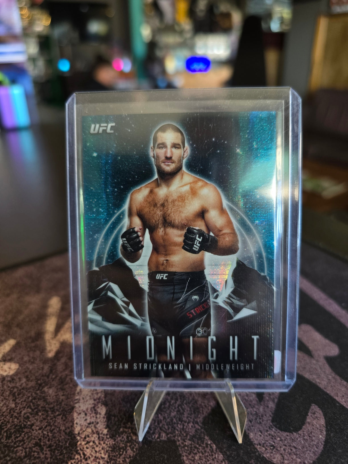 Topps Midnight UFC 2024 - Sean Strickland Moonbeam (/49)