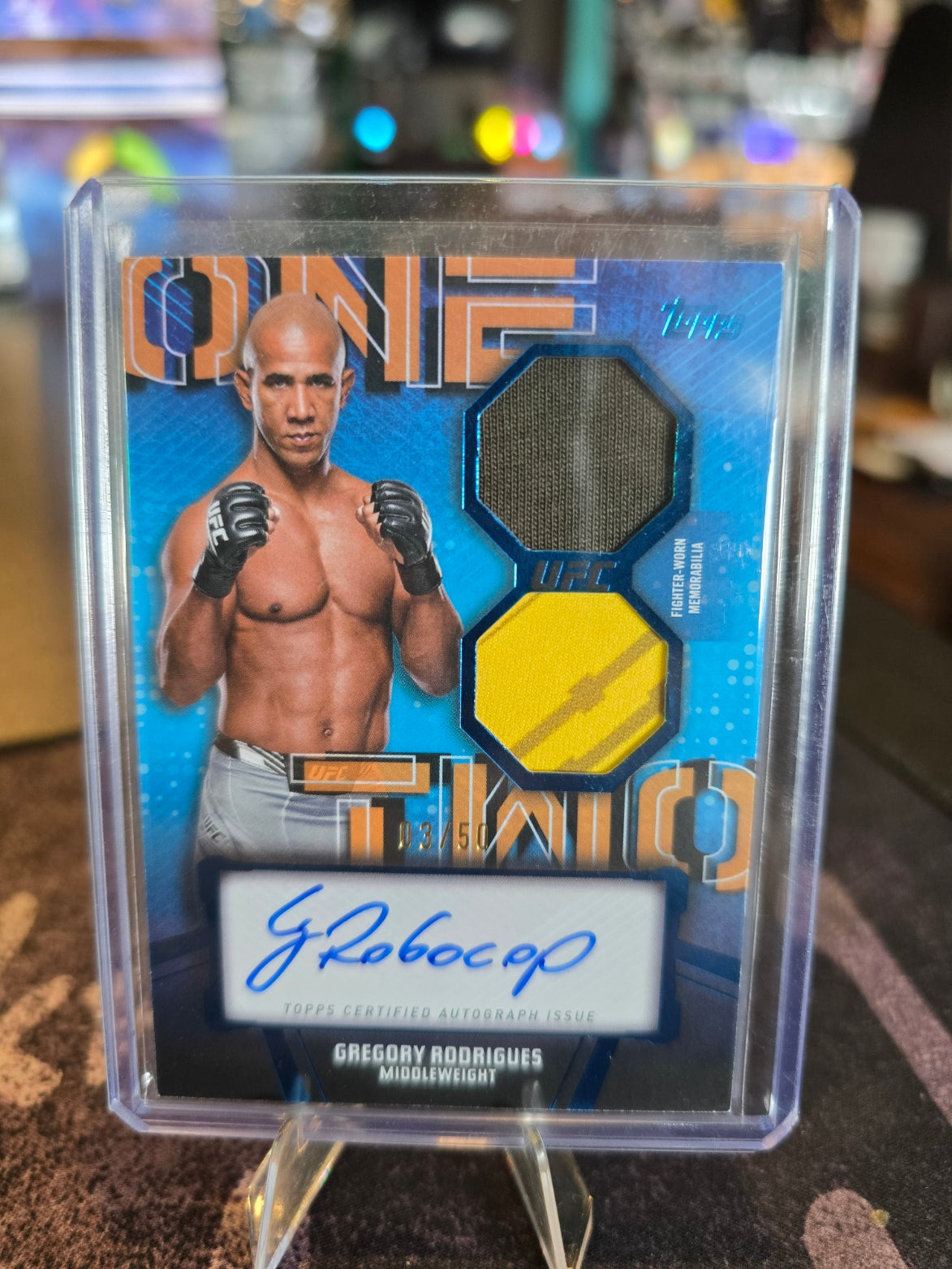Topps UFC Knockout 2024 - Gregory Rodrigues OTC-GRS - Combo Patch Auto Relic 03/50